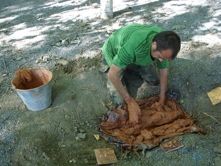 	 Miguel testing the game with the mud - small